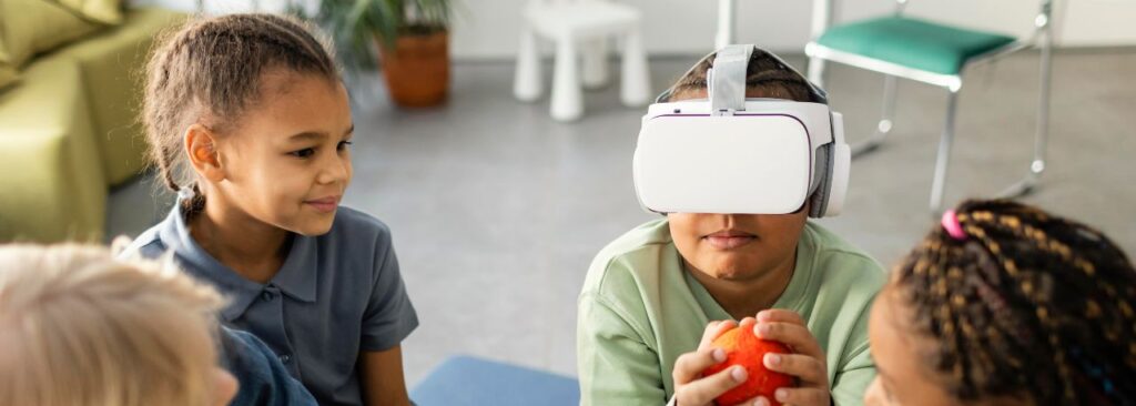 Children engaging with virtual reality in a pediatric occupational therapy session, showcasing how modern technology enhances therapy for developmental growth.